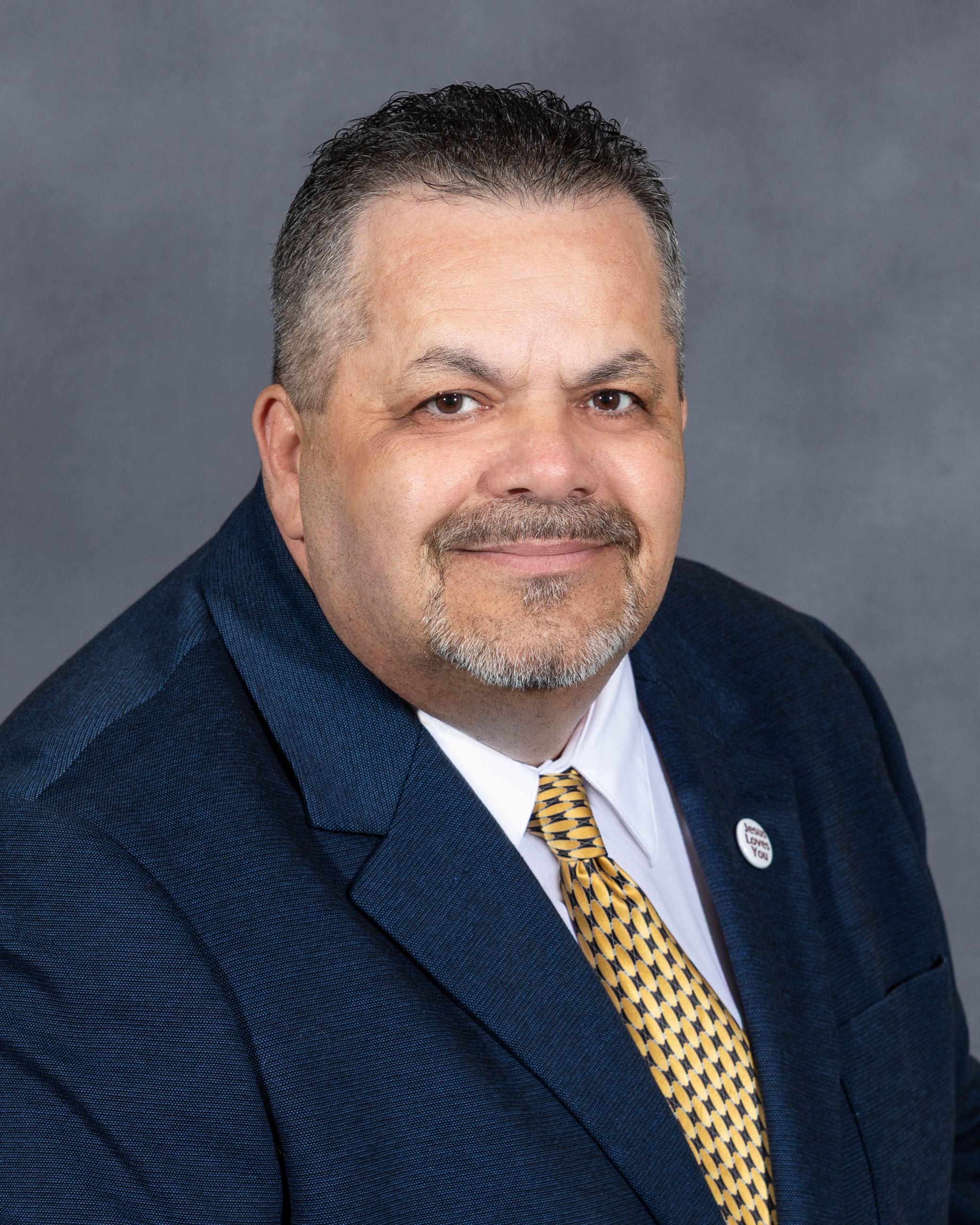 Professional headshot of Council Member Tom Amburgey