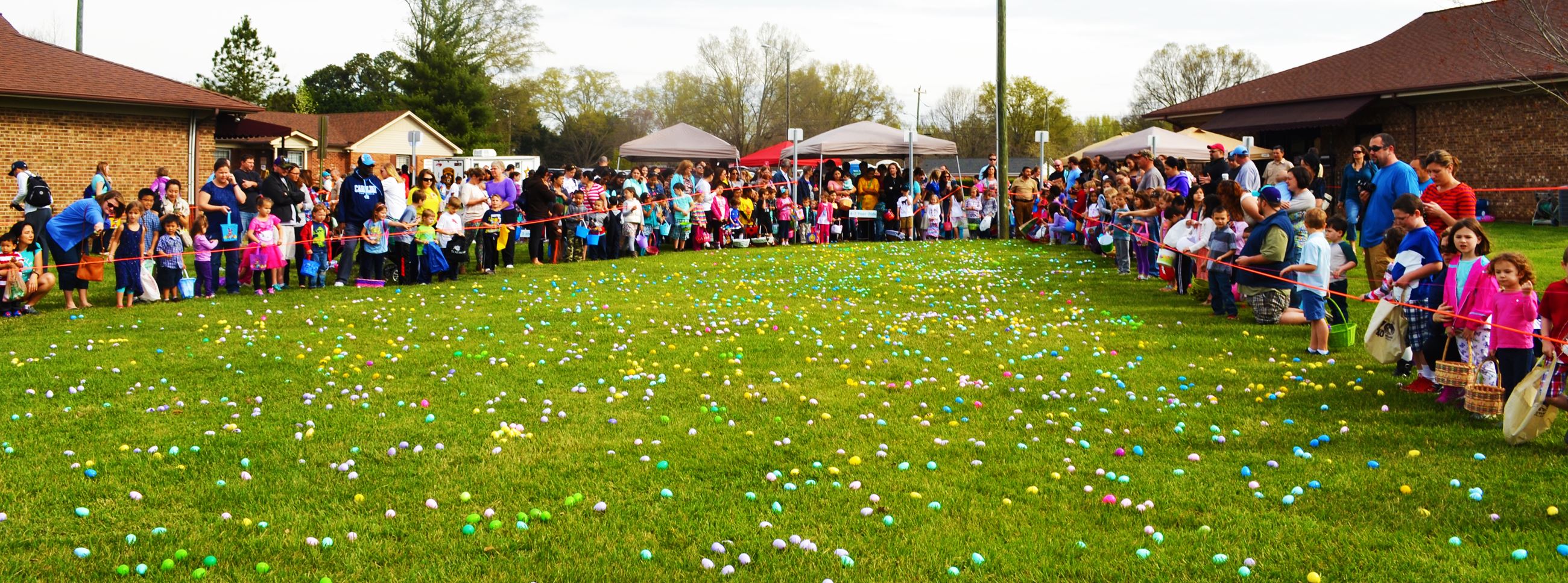 Children get ready for the Easter egg hunt.